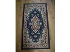 NEAR NEW TRADITONAL PATTERNED NAVY RUG,  This rug is...